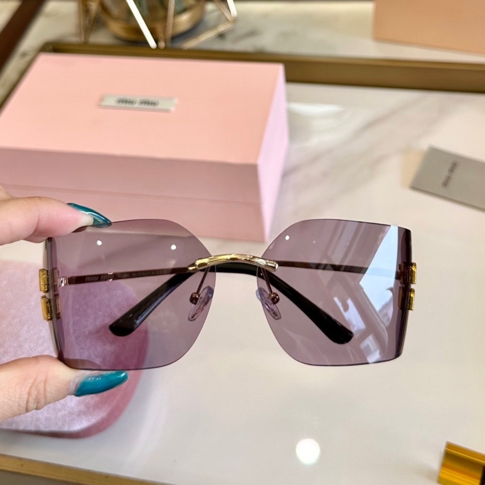 Miu Miu Rimless Sunglasses with Purple Gradient Lenses and Gold Hardware